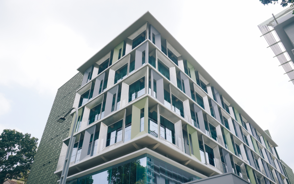 Modern building with green accents.